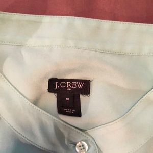 Sleeveless button up mint shirt size 10